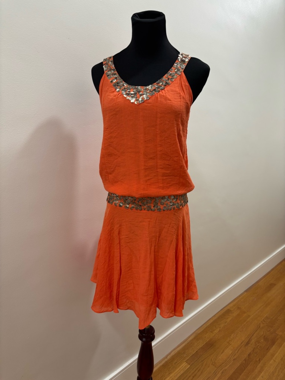 563. Orange Sleeveless Beaded Neckline and Hipline Dress